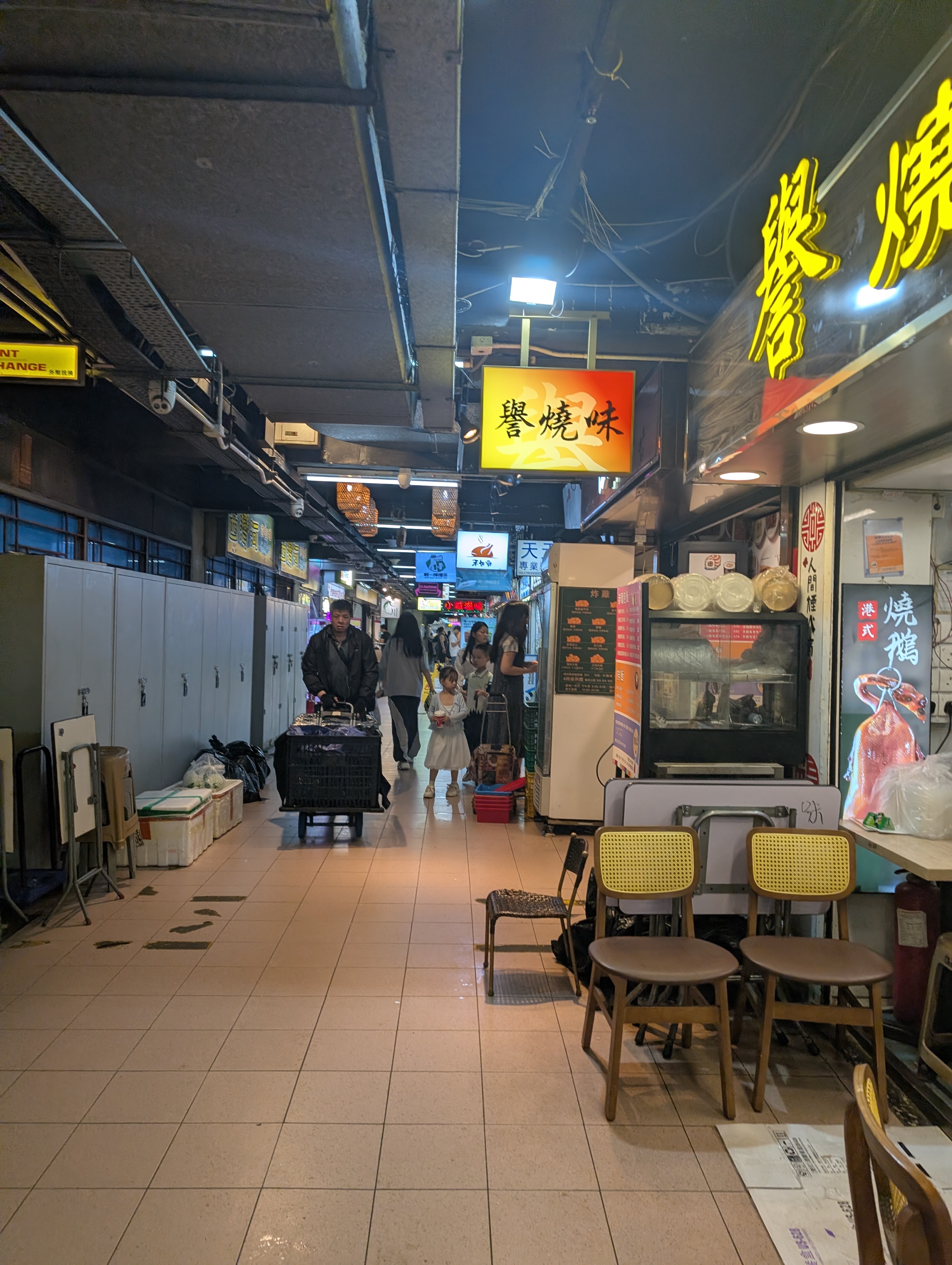 Ground floor with many little business and shops set up